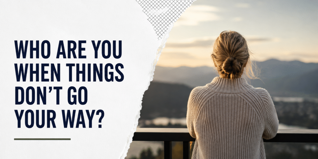 Woman looking out over a landscape, reflecting the mindset needed to handle setbacks as a real estate investor