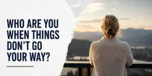 Woman looking out over a landscape, reflecting the mindset needed to handle setbacks as a real estate investor